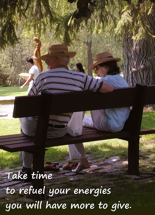 Grandparents sitting on a bench