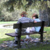 A couple on a park bench